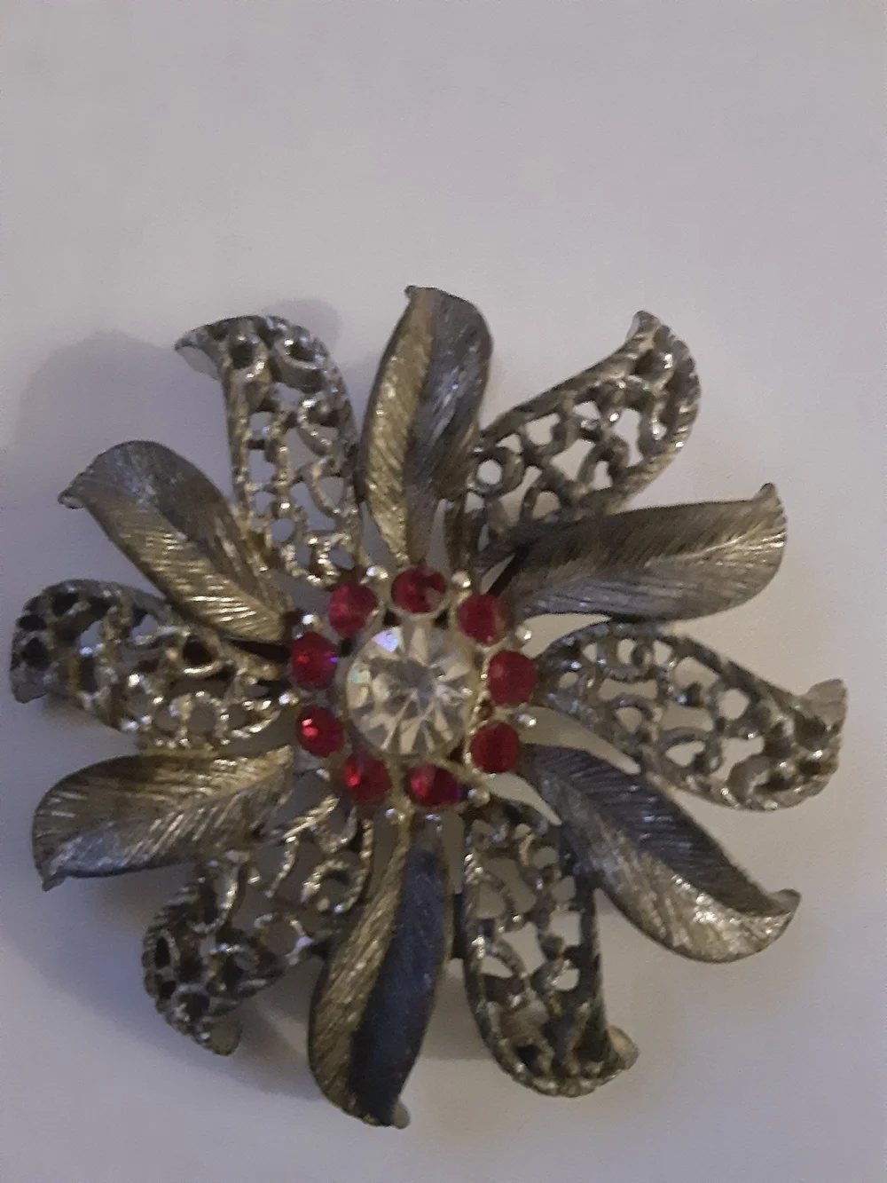 Vintage Pewter Tone Floral Brooch with Red and Clear Rhinestones